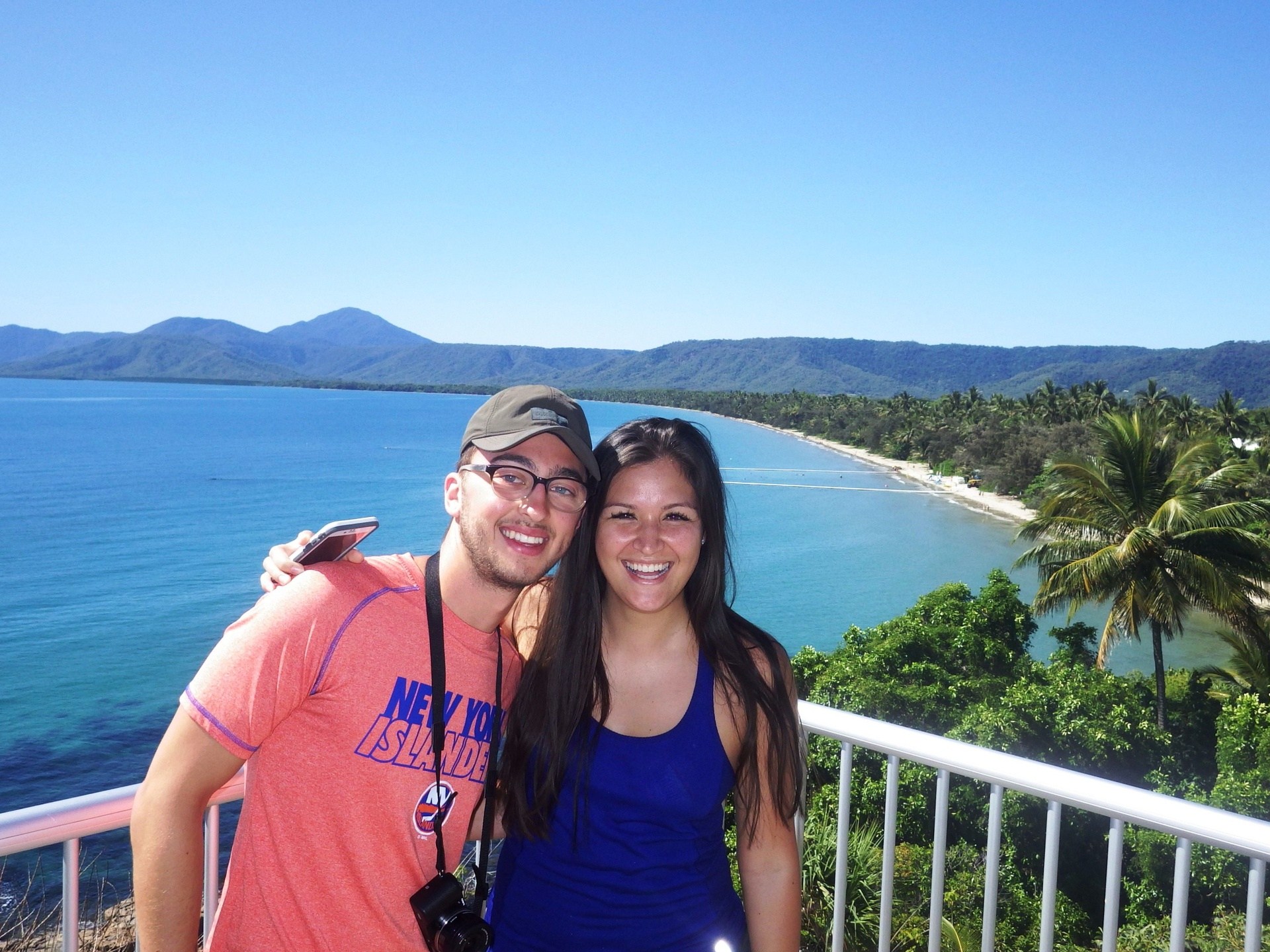 a person standing in front of a body of water