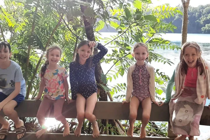 a group of people sitting posing for the camera