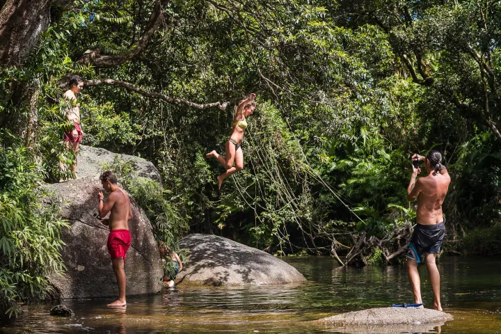 a group of people swimming in the water