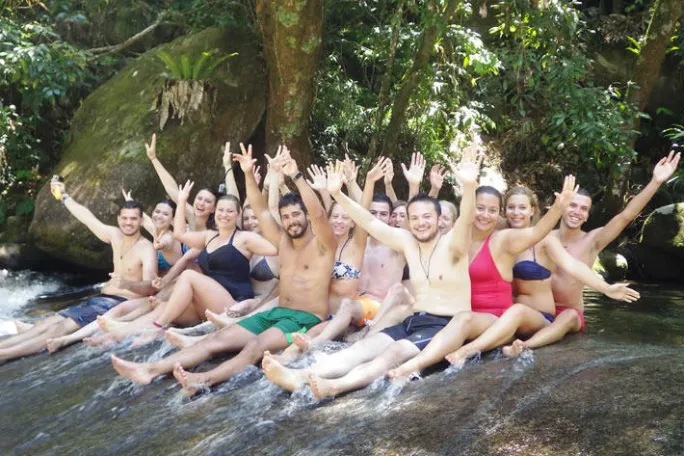 a group of people swimming in the water