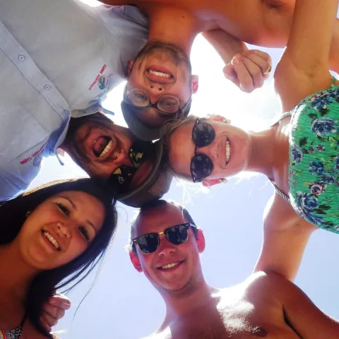 a group of people posing for the camera